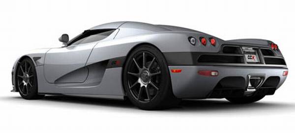 Vemos un auto desde atras diseño aerodinamico rines de lujo y espejos 